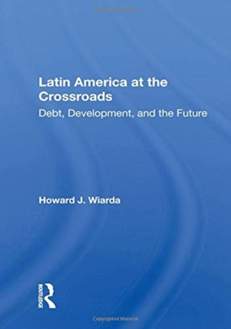 Book cover of: Latin America At The Crossroads. By: Howard J. Wiarda