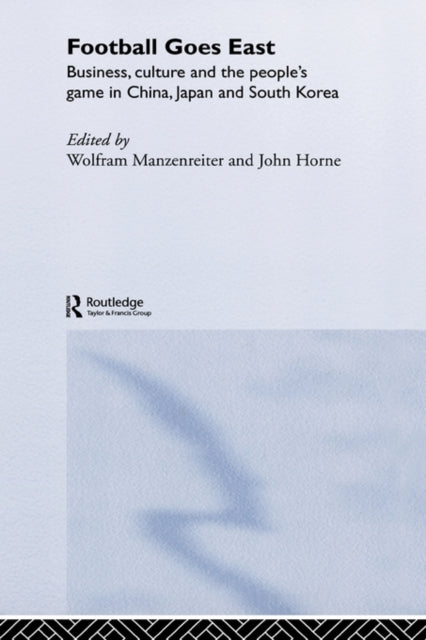 Book cover of: Football Goes East. By: Manzenreiterm