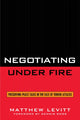 Book cover of: Negotiating Under Fire. By: Matthew Levitt