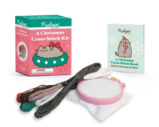 Book cover of: Pusheen: A Christmas Cross-Stitch Kit. By: Claire Belton