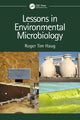Book cover of: Lessons in Environmental Microbiology. By: Roger Tim Haug