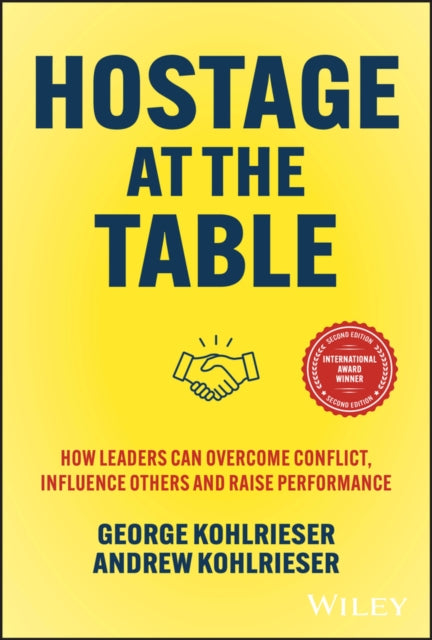 Book cover of: Hostage at the Table. By: G. Kohlrieser