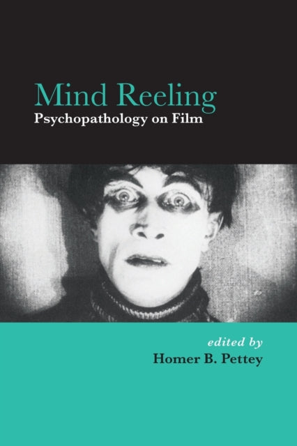 Book cover of: Mind Reeling. By: HOMER PETTEY