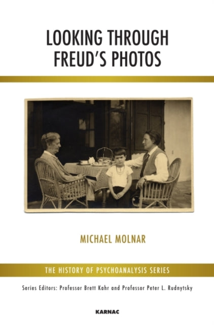 Book cover of: Looking Through Freud's Photos. By: Michael Molnar